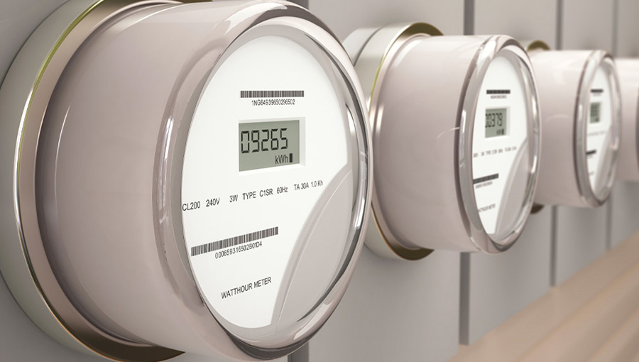 multiple electric meters on a wall